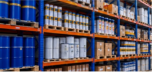 Drums of oil, grease and filters on a store shelf